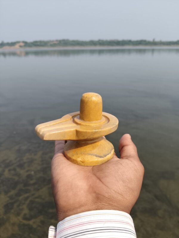 Yellow akhand narmadeshwar shivling for home
